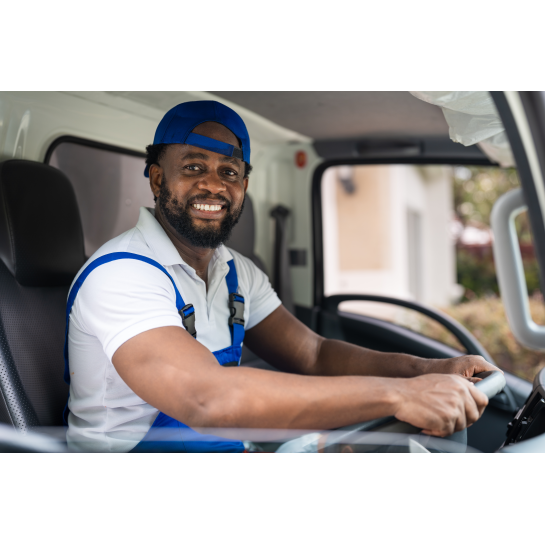 smiling man mover worker in blue uniform driving t 2024 12 04 16 10 14 utc